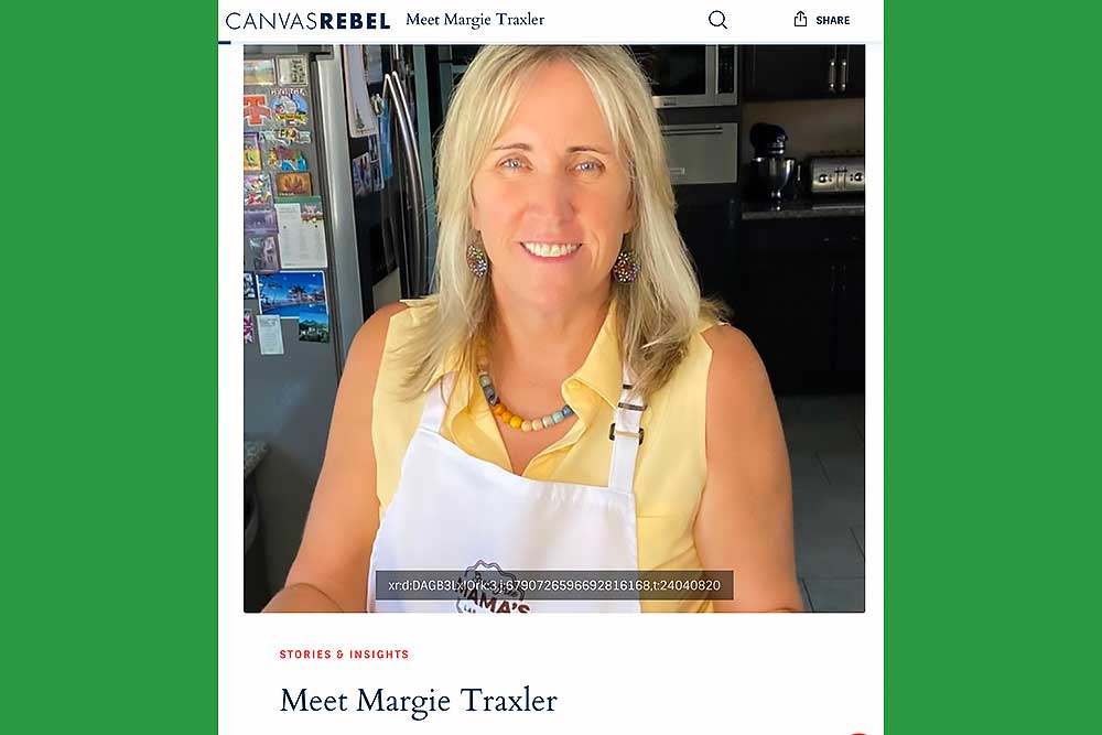 A person in a kitchen wearing a white apron and yellow top, smiling warmly. The modern kitchen background includes a stainless steel fridge. This scene reflects a wholesome, allergen-friendly lifestyle focused on fresh, natural, and nourishing meals.| Daré Vita Café | Las Vegas