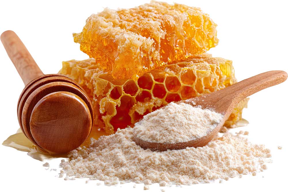 honey-and-coconut-ingredients A wooden honey dipper, golden honeycomb, and a wooden spoon filled with white powder are arranged on a white background, representing the natural and wholesome ingredients used in allergen-friendly and vibrant recipes.| Daré Vita Café | Las Vegas